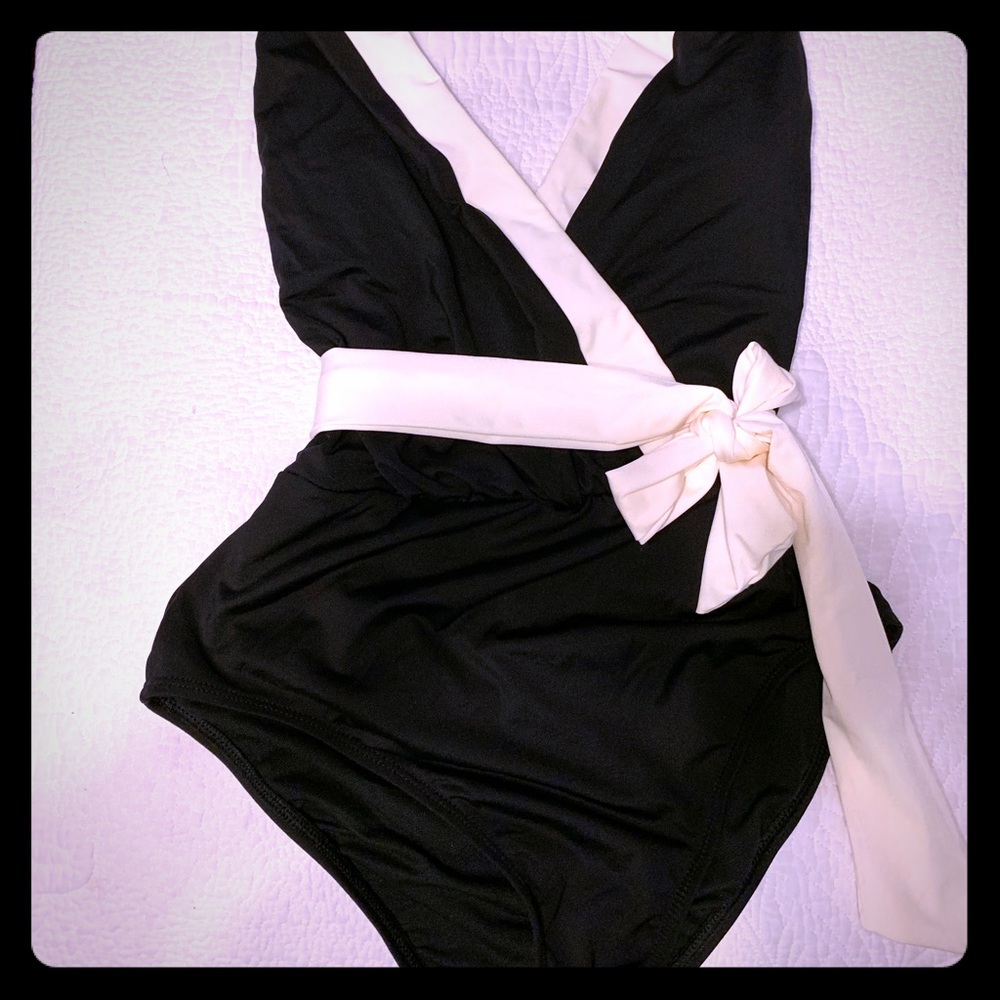 Size 6 NWT black & beige one piece.